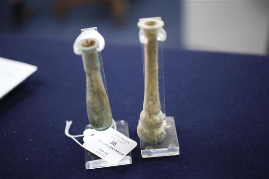 Two Roman glass unguentarium, c, 2nd century A.D., 12 and 9cm